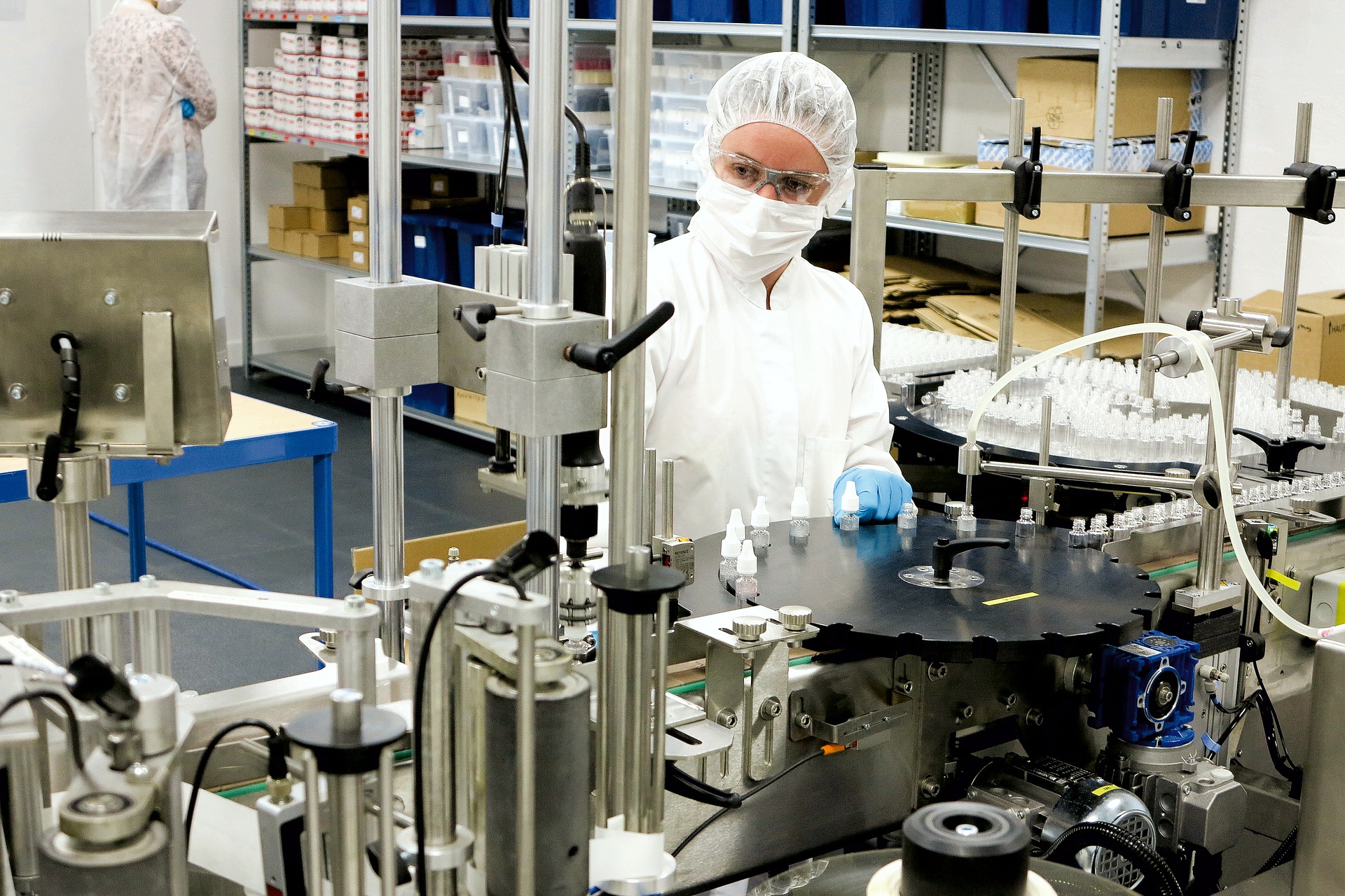 Advanced production team working inside a clean manufacturing facility